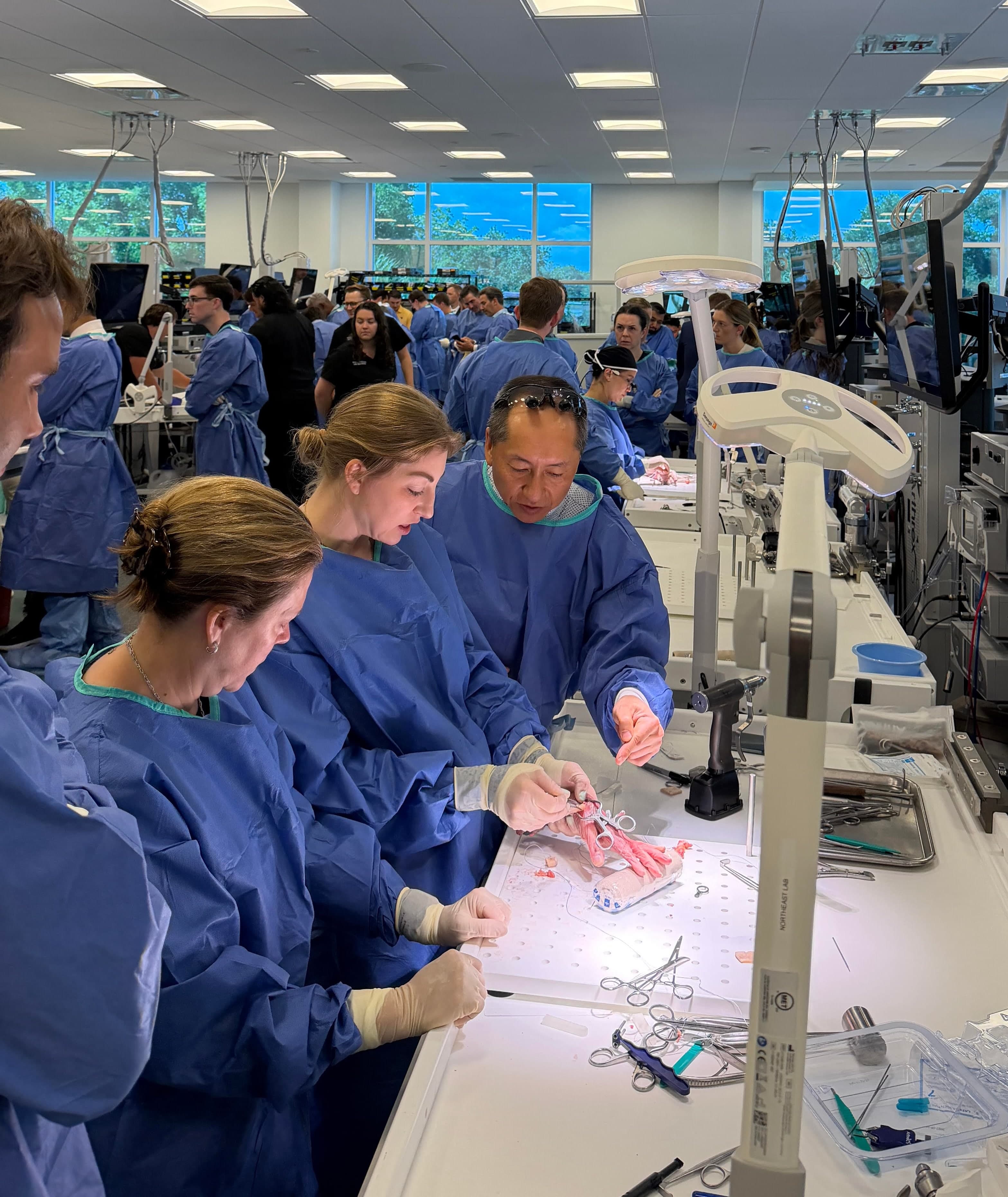 Dr. Lee teaching hand surgery technique at an Arthrex surgical skills course